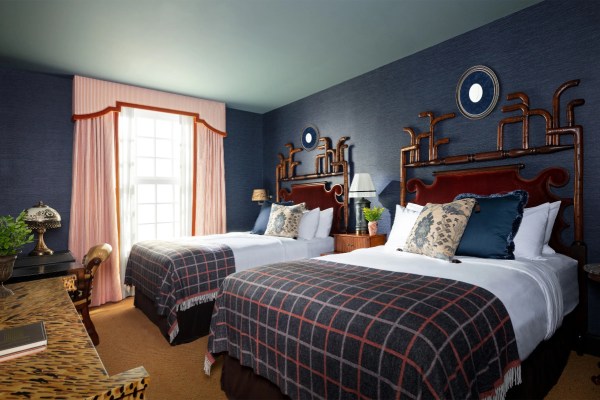 Interior of a hotel room with two beds