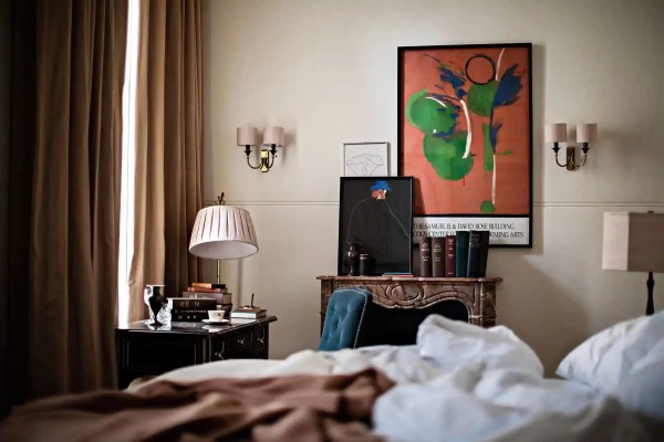 Interior of a hotel room with bed and furnishings