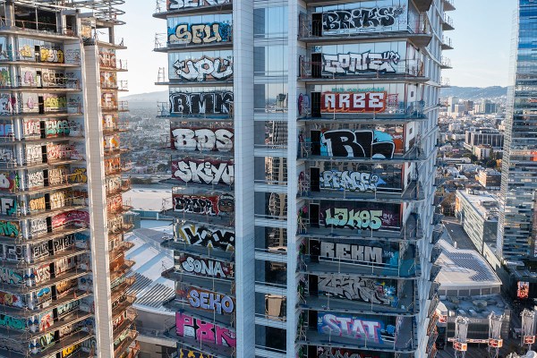 Aerial view of graffiti covered towers in downtown Los Angeles.