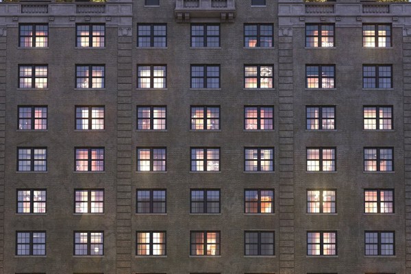 Exterior of a hotel showing windows across six floors