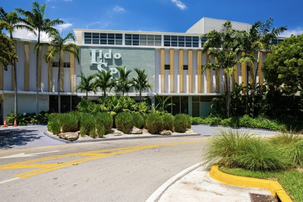 Exterior of a low slung motel in Miami