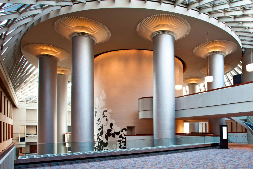 image of a mural in the interior of a high-ceilinged Westin Peachtree Plaza hotel in Atlanta