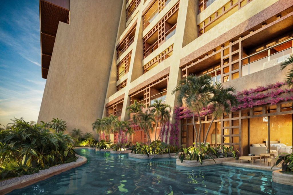 a revamped hotel with a pool in Mexico